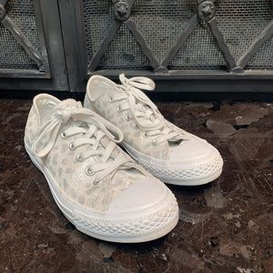 Gently used white with silver cheetah print